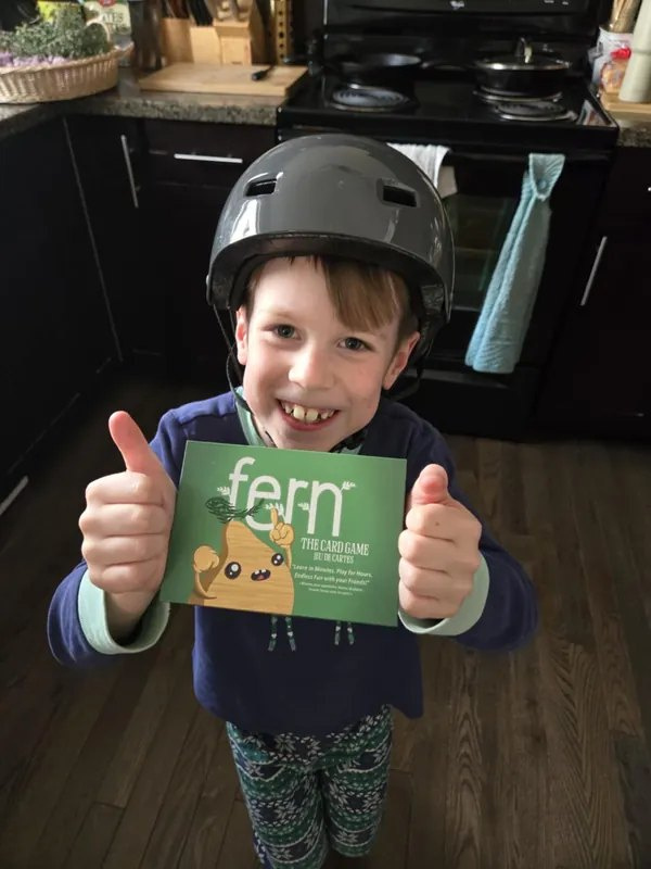 A Fern player holding the game